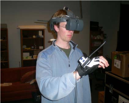 Using a 3D UI while wearing a head-mounted display. The TV in the background shows the image displayed in the HMD.