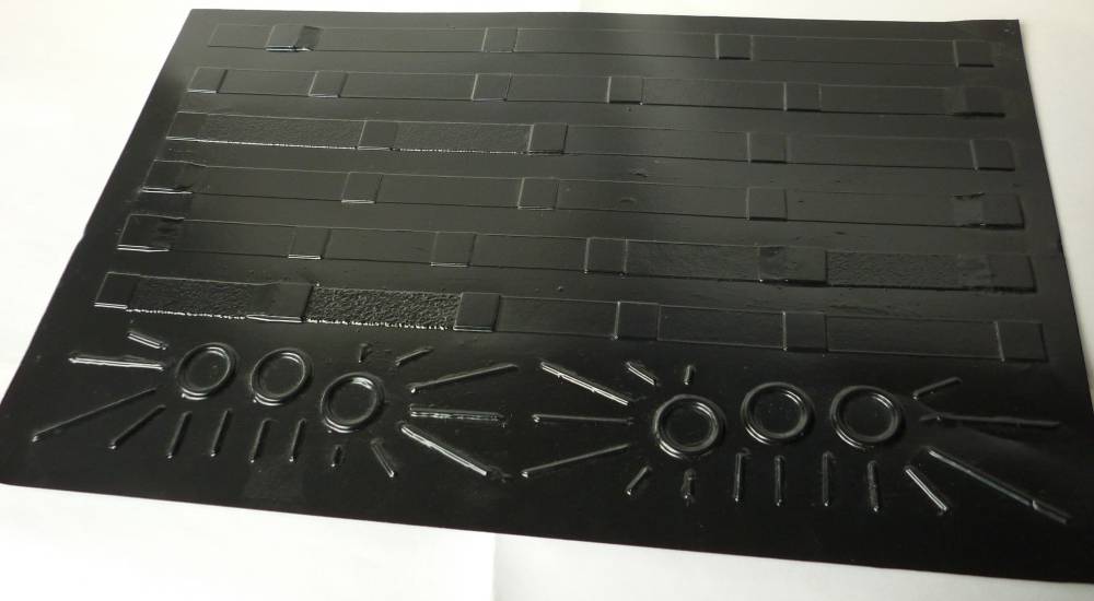 A tactile overlay for conveying the structural information from a page of music notation. Made from vacuum-formed pvc, the overlay displays key elements such as bars, lines to a page, repeat marks etc